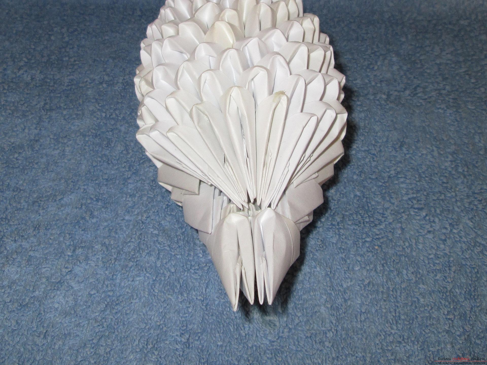 Если вы любите собирать модульное оригами, этот мастер-класс по созданию дельфина из бумаги для вас.. Фото №20